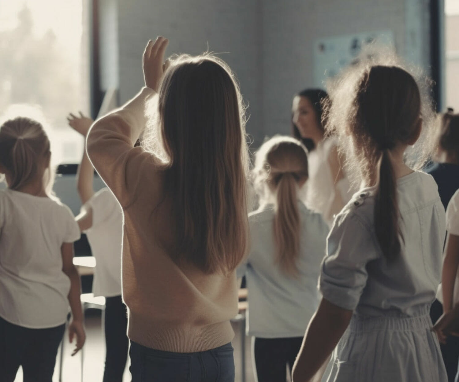 kids in classroom dancing and teacher dancing with teacher